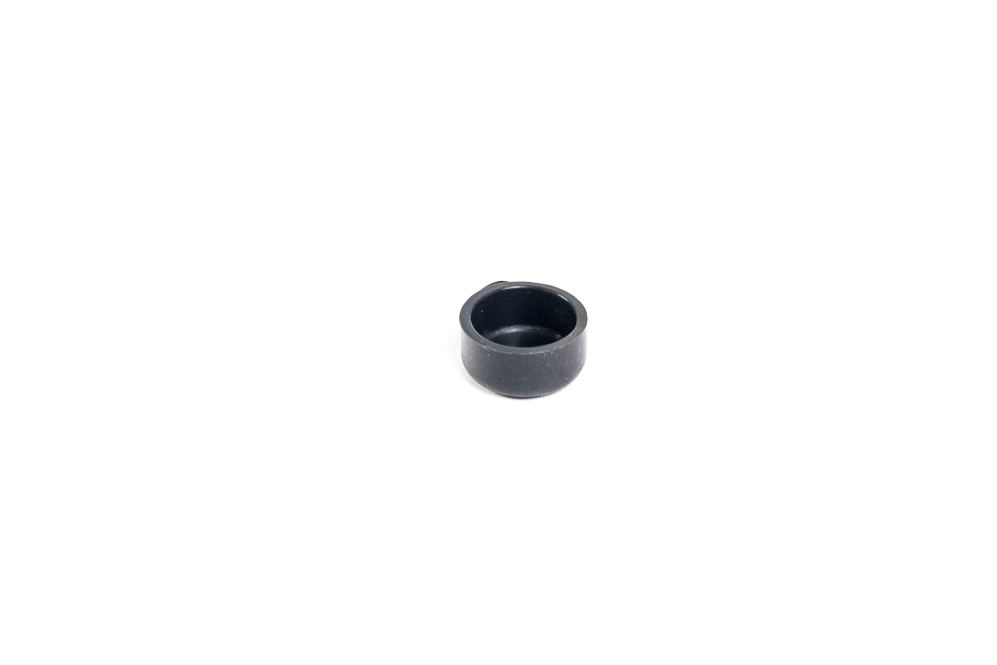 Silicone end cap for the removable check valve